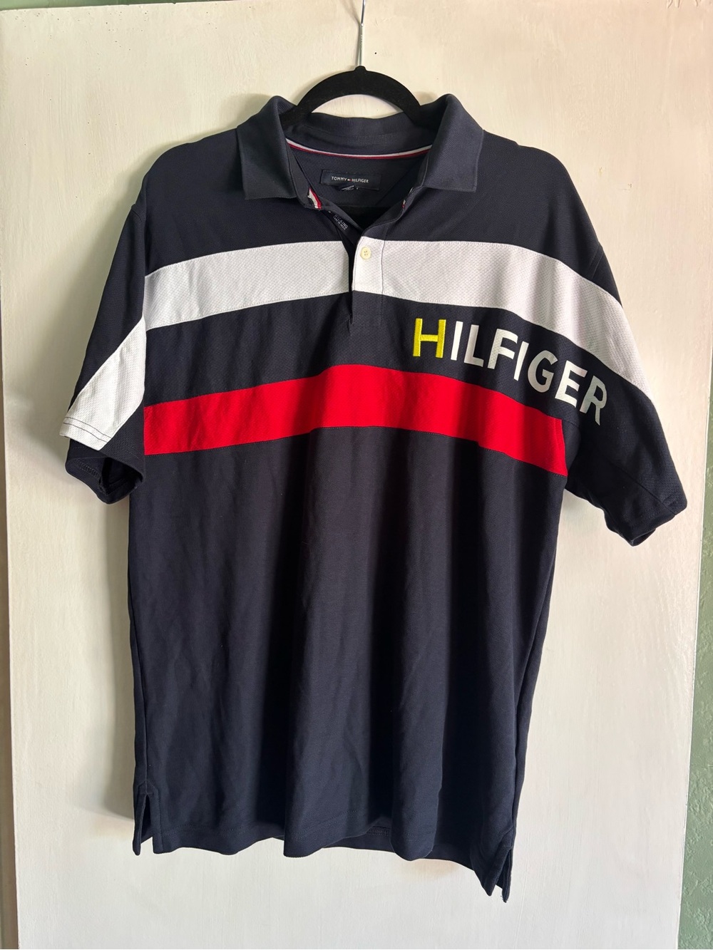 Tommy Hilfiger Men’s Navy Polo Shirt with Red & White Stripe